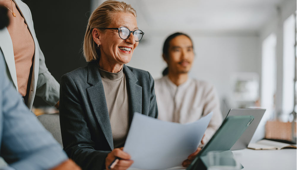 Business executive meeting with peers.