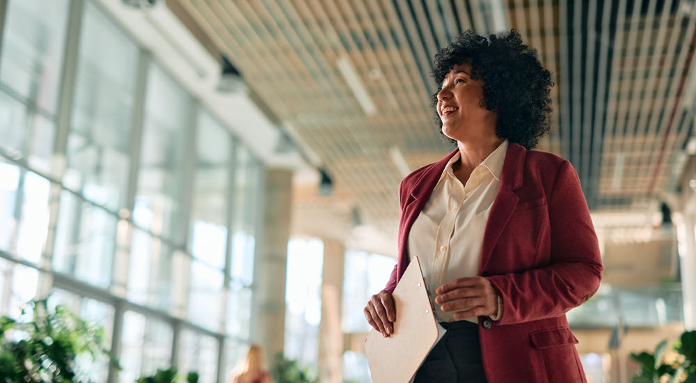 C suite executives discussing growth with bank executive.