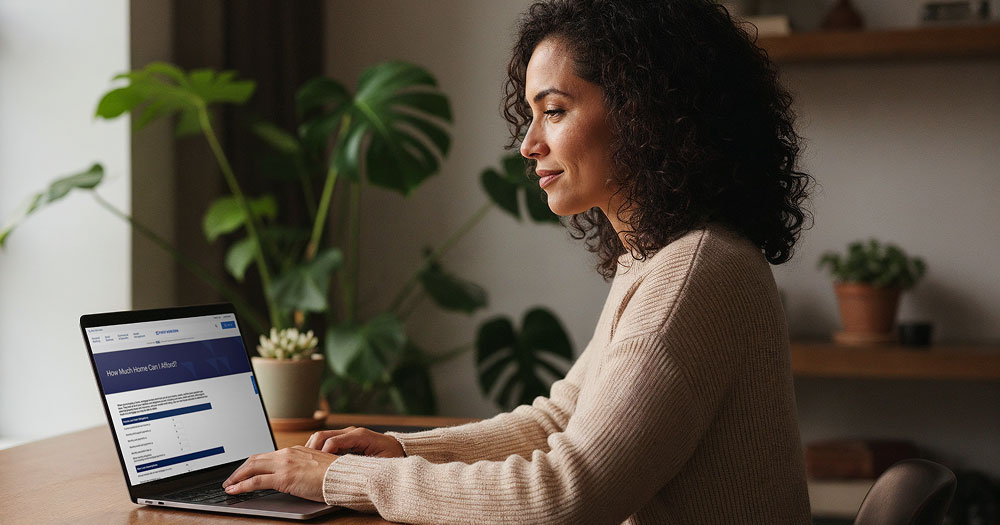 Woman typing on laptop computer