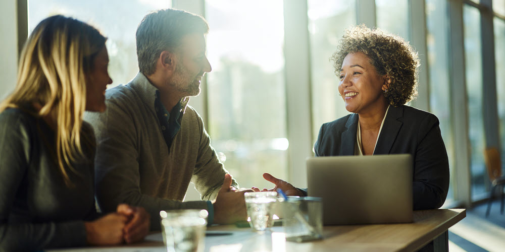 Couple meeting with their banker.