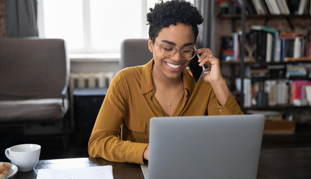 Woman working on her laptop computer.