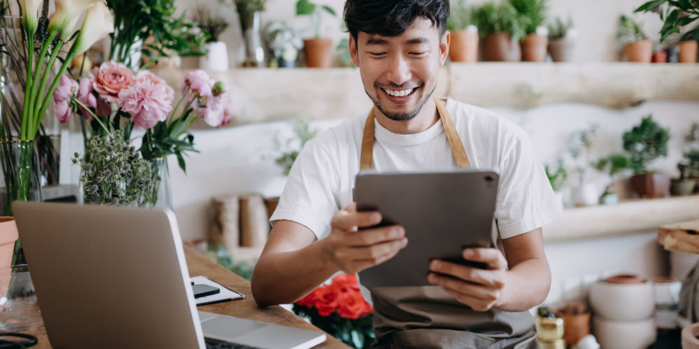 Small business owner using treasury management