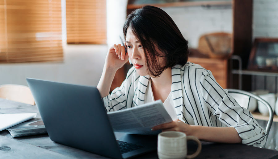 Woman Reviewing Financial Statement