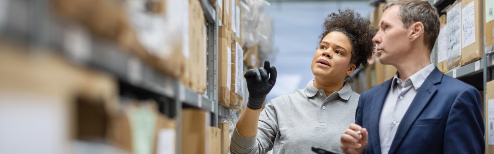 Warehouse workers talking