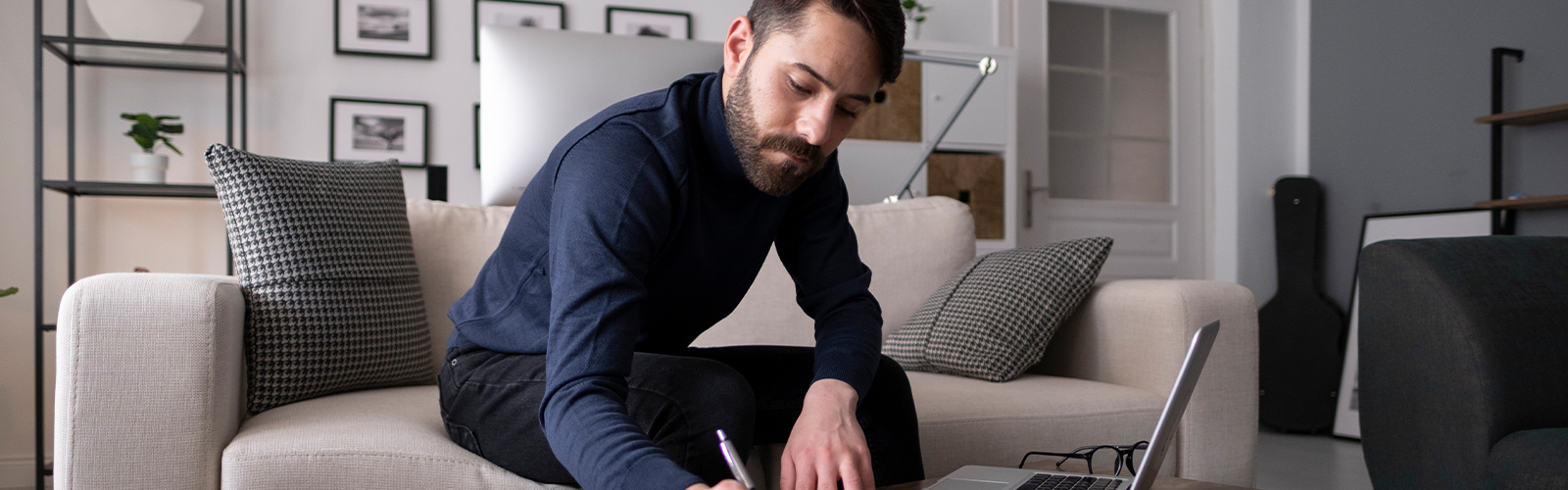 A young man using Paychex Payroll solutions