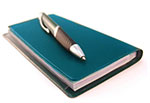 Checkbook with pen on top